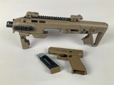 an image of a toy gun with a magazine attached to it