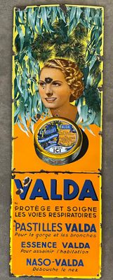 an image of a yellow and black sign with a woman ' s face on it