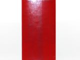 a red box that is sitting on a white surface