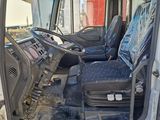 an image of the inside of a truck with the driver ' s seat up