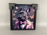 framed picture of a french bulldog wearing a tuxedo with butterflies in the background