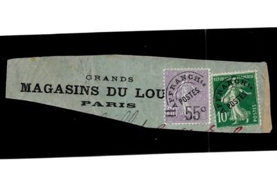 une image représentant une feuille de papier sur laquelle figure un timbre