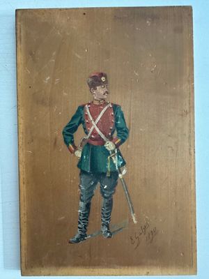 une vieille photo d'un soldat en uniforme, avec une épée