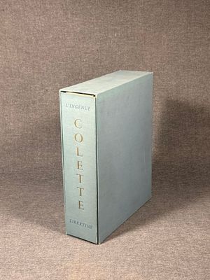 a book that is sitting in a box on a table
