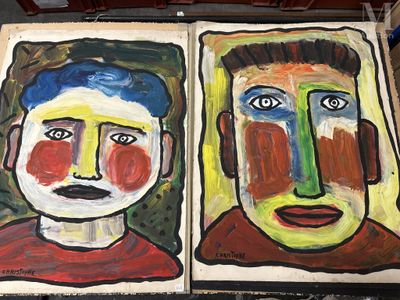 tableau représentant les visages d'un homme et d'une femme posés sur une table