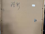 a box with some writing on it sitting on the floor