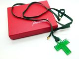a red box with a green cross on it