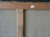 a picture of a piece of wood with a sticker on it