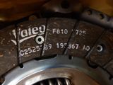 a close up of a clutch plate with a number on it