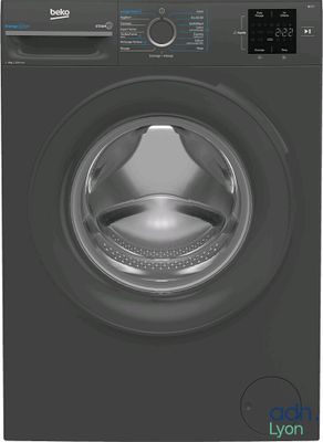 une machine à laver dont la porte est ouverte et la porte d'entrée ouverte