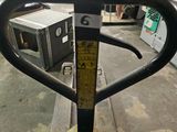 an image of a forklift with a measuring tape on it
