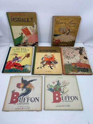 six children ' s books are lined up on a white surface