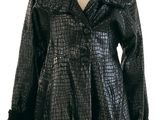 an image of a black leather coat on a mannequin