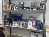 a room that has a shelf with many different items on it