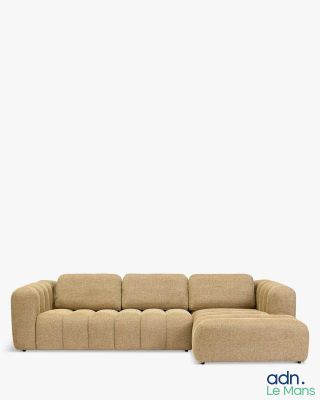 an image of a beige couch with a chaise lounger on it