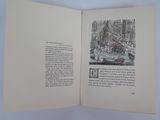 an open book with a picture of a boat on it