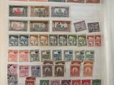 un livre avec beaucoup de timbres