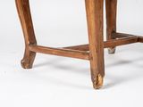 a wooden table with a glass top on a white background