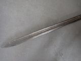 a close up of a knife on a piece of cloth