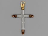 an image of a cross made out of glass and gold