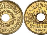 une pièce d'or portant une inscription en arabe au recto et l'effigie d'une couronne au verso