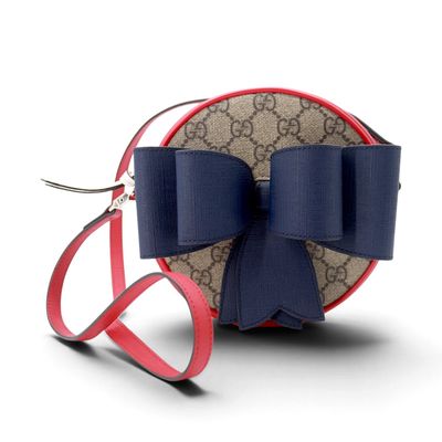 une image représentant un sac à main orné d'un nœud