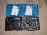 two tools in a blue case on the floor