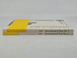 two books that are stacked on top of each other
