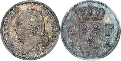 a close up of a coin with a crown on top of it