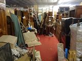 a room filled with lots of boxes and other things