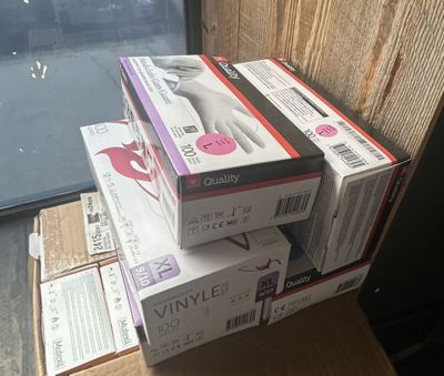 many boxes stacked on top of each other on a table
