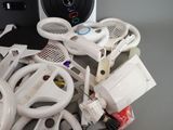 a pile of assorted electronics sitting on a table