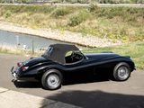 a black sports car parked on the side of the road