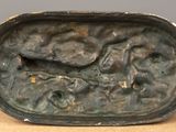 an image of a bronze statue of a man and a woman
