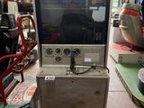 a small machine that is sitting in a room
