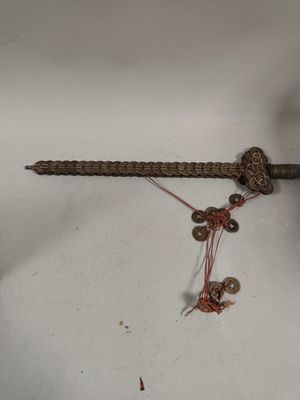a small piece of metal that has been placed on a table