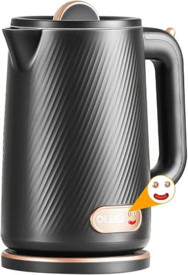 une bouilloire électrique noire sur laquelle est dessiné un smiley