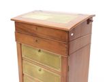 a small wooden chest of drawers with a glass top