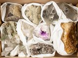 a box full of different types of rocks in it