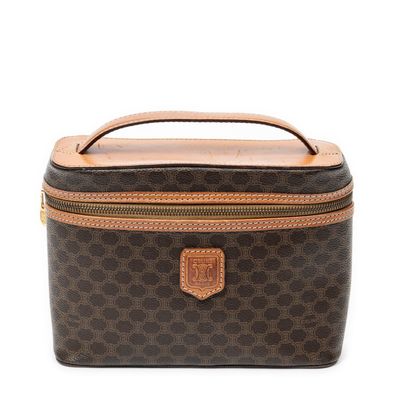 a brown and black bag with a brown handle