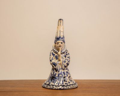 Cloche en faïence de DELFT à décor de personnage.