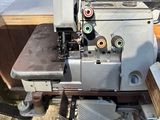 a sewing machine that is sitting on a table
