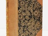 an old book with a bunch of skulls on it