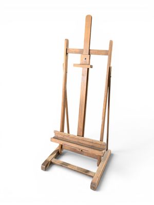 une image représentant un chevalet en bois sur fond blanc