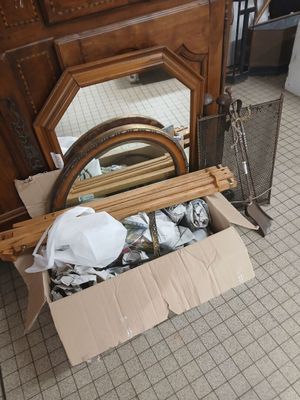 a cardboard box with a mirror and a mirror in it