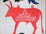 a poster with a bull and a bird on it