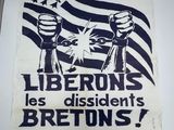 an image of a political poster on a table in front of a cell phone