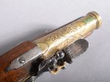 a close up of a gun on a table