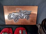 a picture of a picture of an old car and a pair of shoes