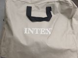 a bag with a logo on it sitting on a table
